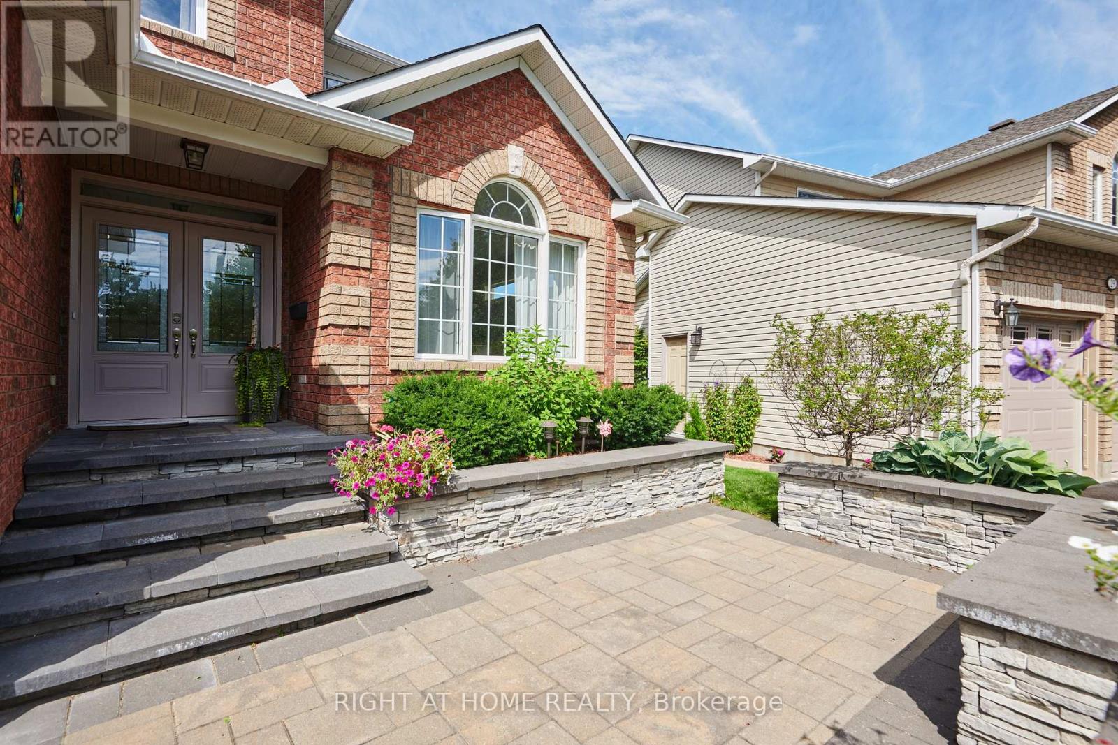 Double entrance door, beautiful landscaping