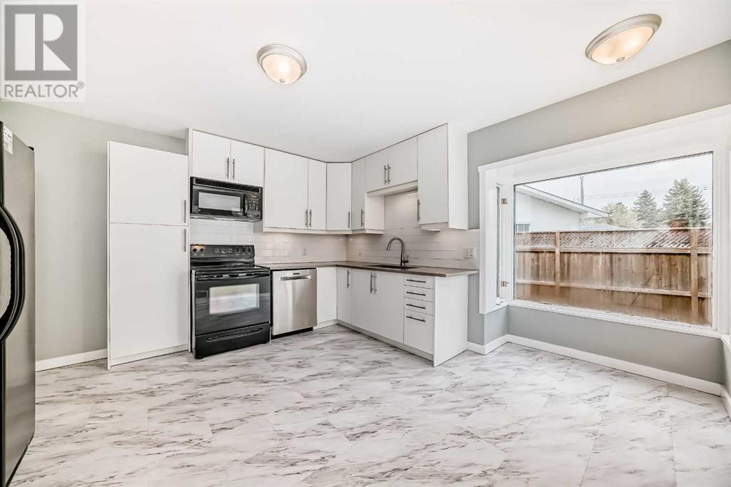 Single Family House Bungalow for Sale in  Glenmount Crescent SW Glendale Calgary 