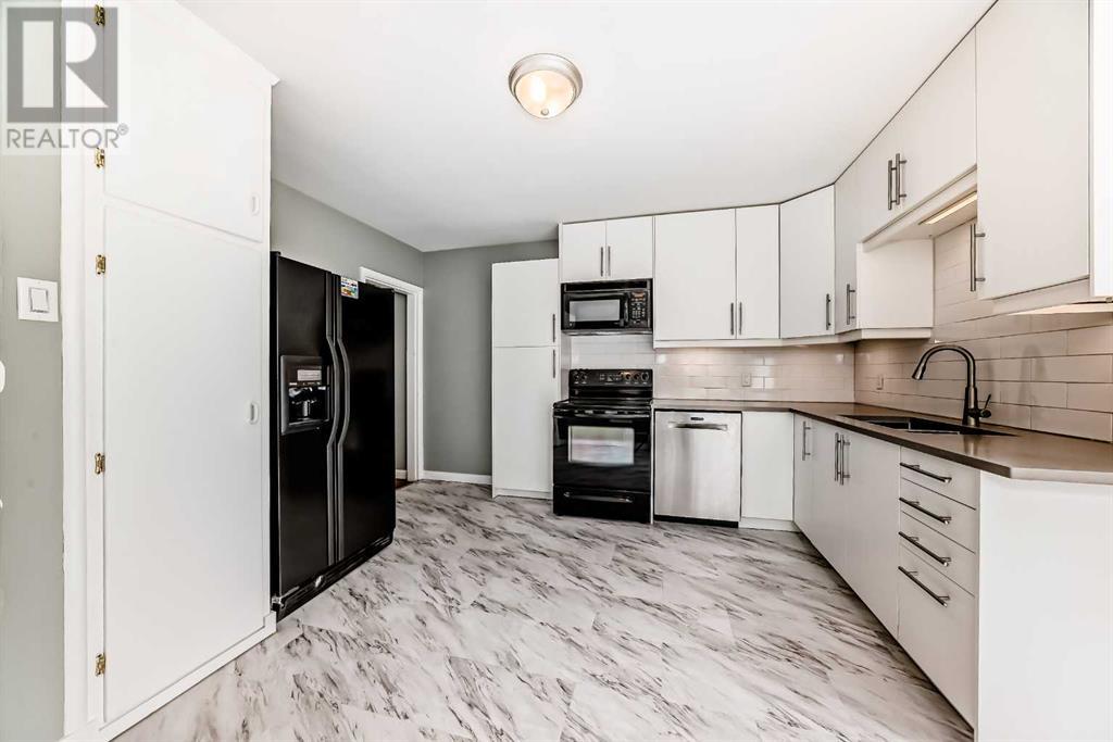 Single Family House Bungalow for Sale in  Glenmount Crescent SW Glendale Calgary 