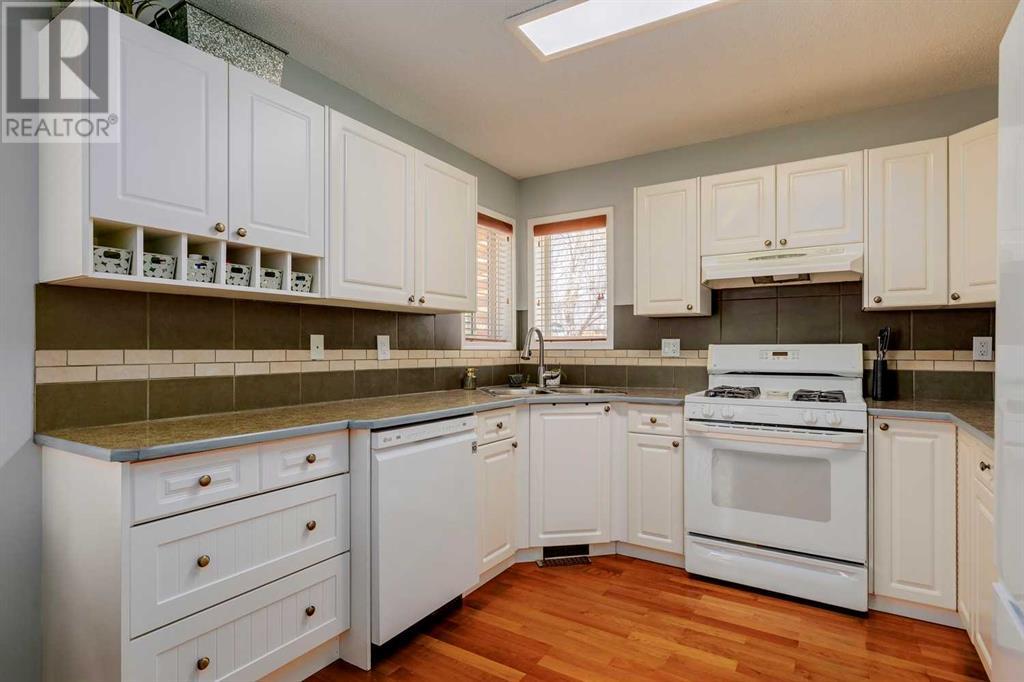 Single Family House Bi-level for Sale in  Alcock Close Rosemont Okotoks 