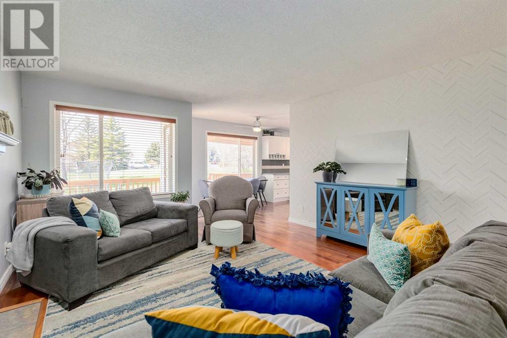 Single Family House Bi-level for Sale in  Alcock Close Rosemont Okotoks 