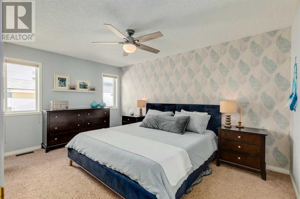 Single Family House Bi-level for Sale in  Alcock Close Rosemont Okotoks 