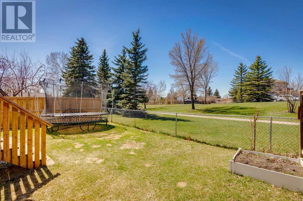 Single Family House Bi-level for Sale in  Alcock Close Rosemont Okotoks 