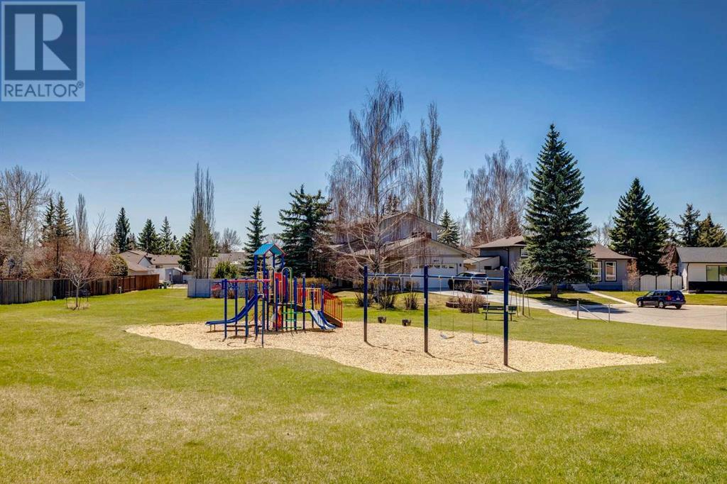 Single Family House Bi-level for Sale in  Alcock Close Rosemont Okotoks 