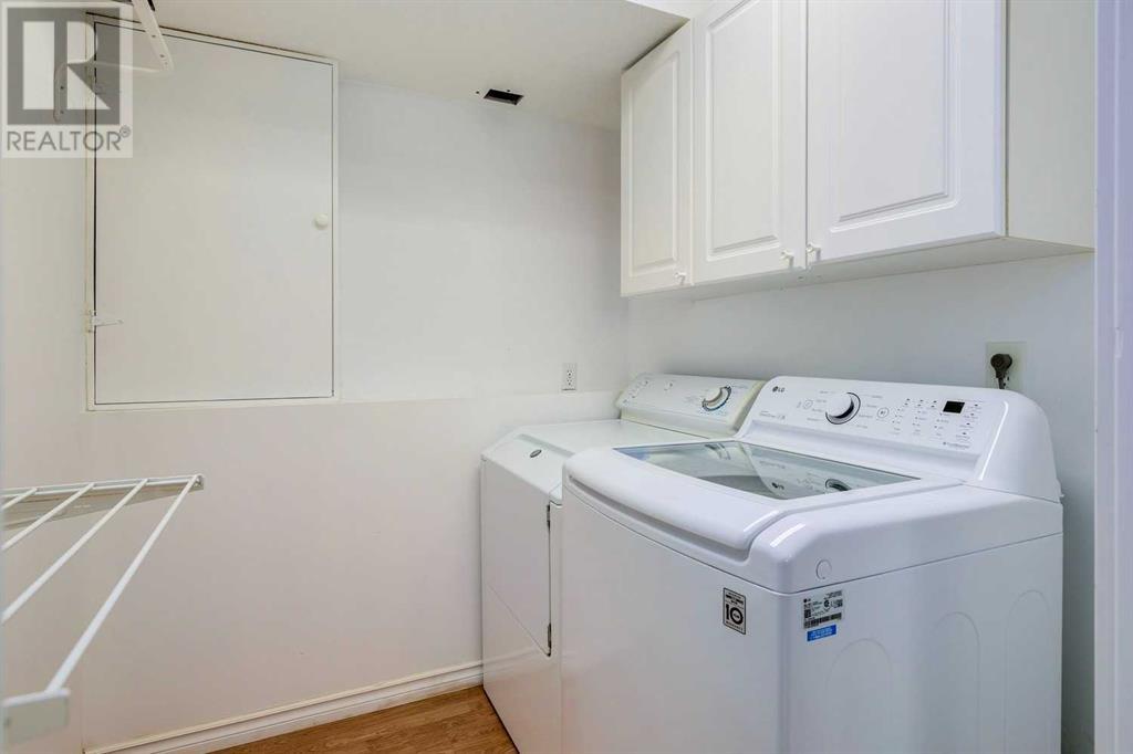 Single Family House Bi-level for Sale in  Alcock Close Rosemont Okotoks 