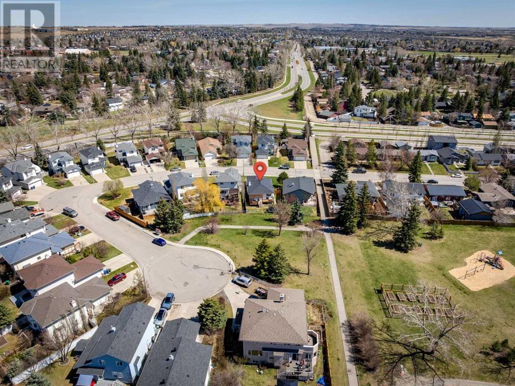 Single Family House Bi-level for Sale in  Alcock Close Rosemont Okotoks 