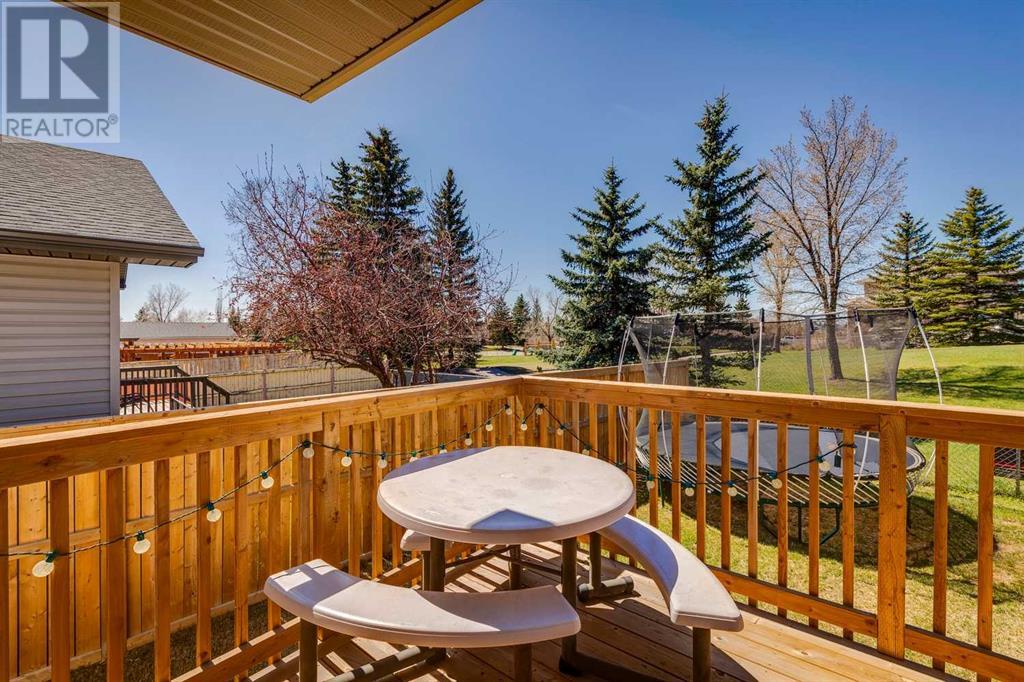 Single Family House Bi-level for Sale in  Alcock Close Rosemont Okotoks 