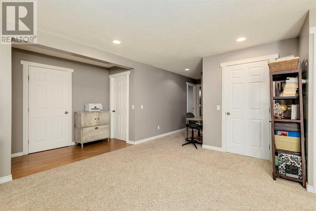 Single Family House Bi-level for Sale in  Alcock Close Rosemont Okotoks 
