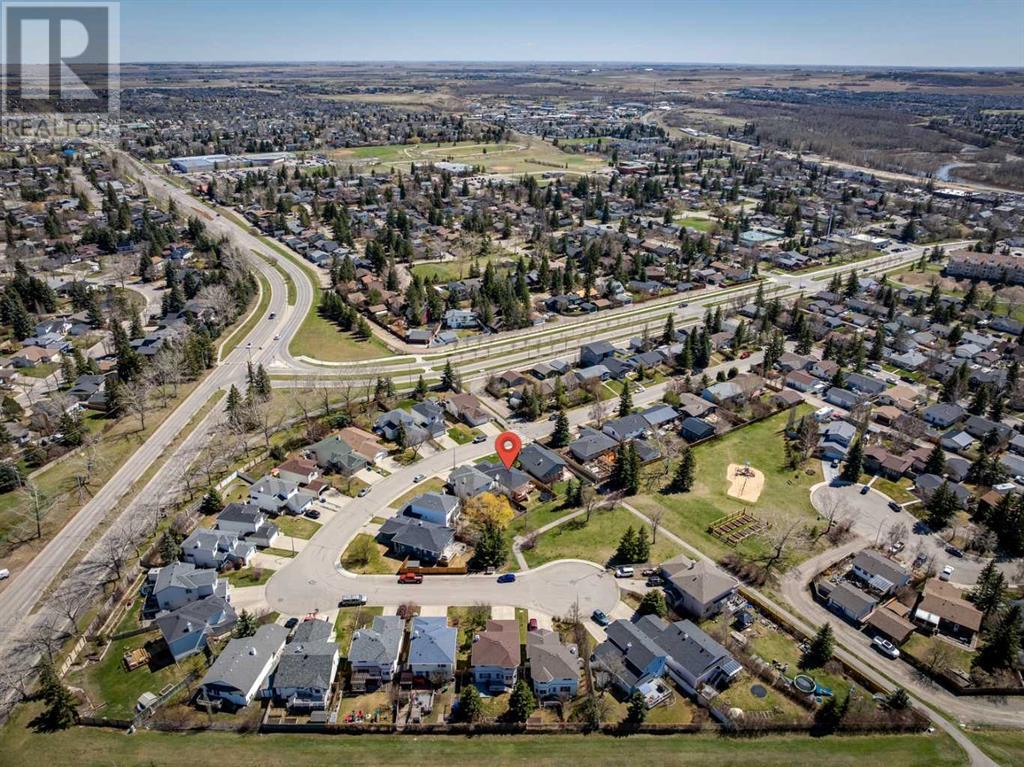 Single Family House Bi-level for Sale in  Alcock Close Rosemont Okotoks 