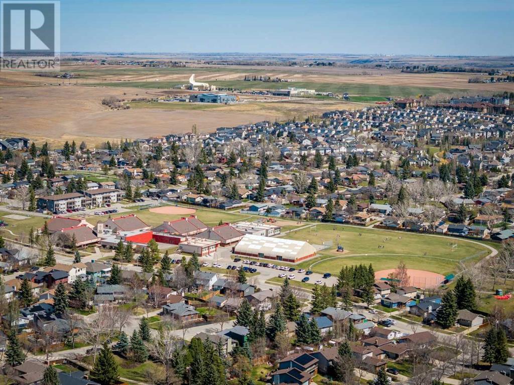 Single Family House Bi-level for Sale in  Alcock Close Rosemont Okotoks 