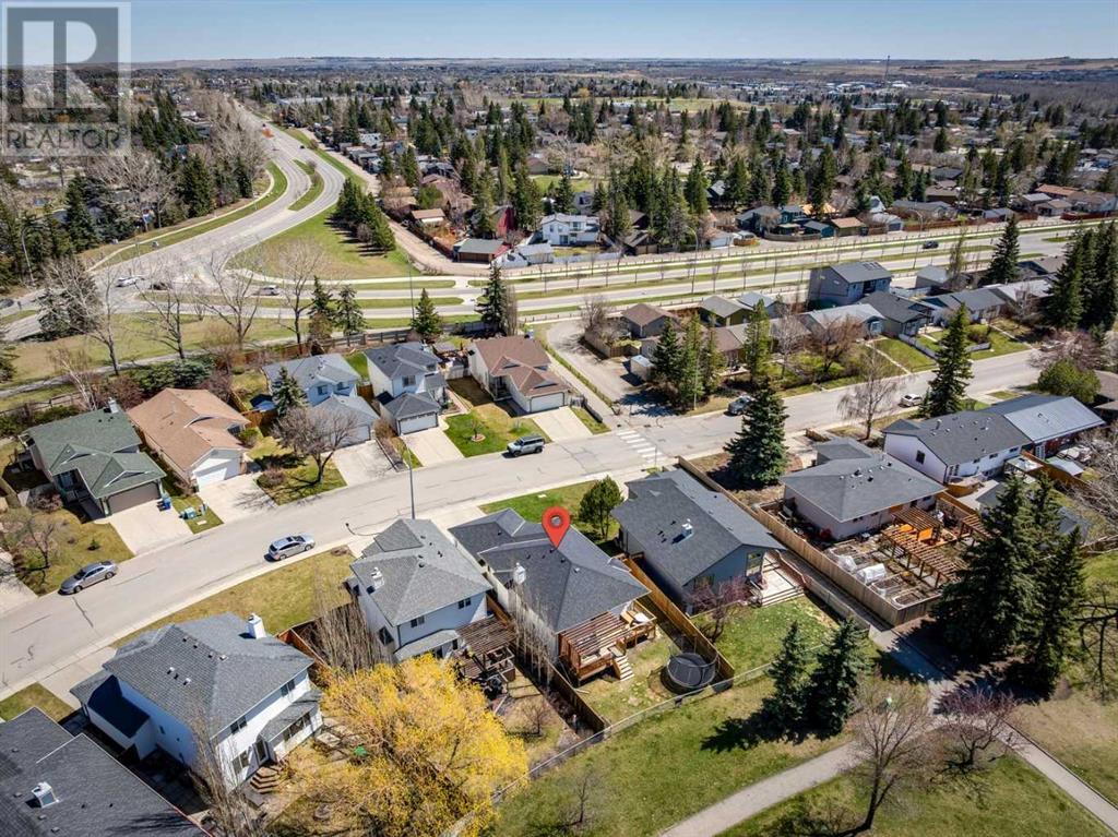 Single Family House Bi-level for Sale in  Alcock Close Rosemont Okotoks 