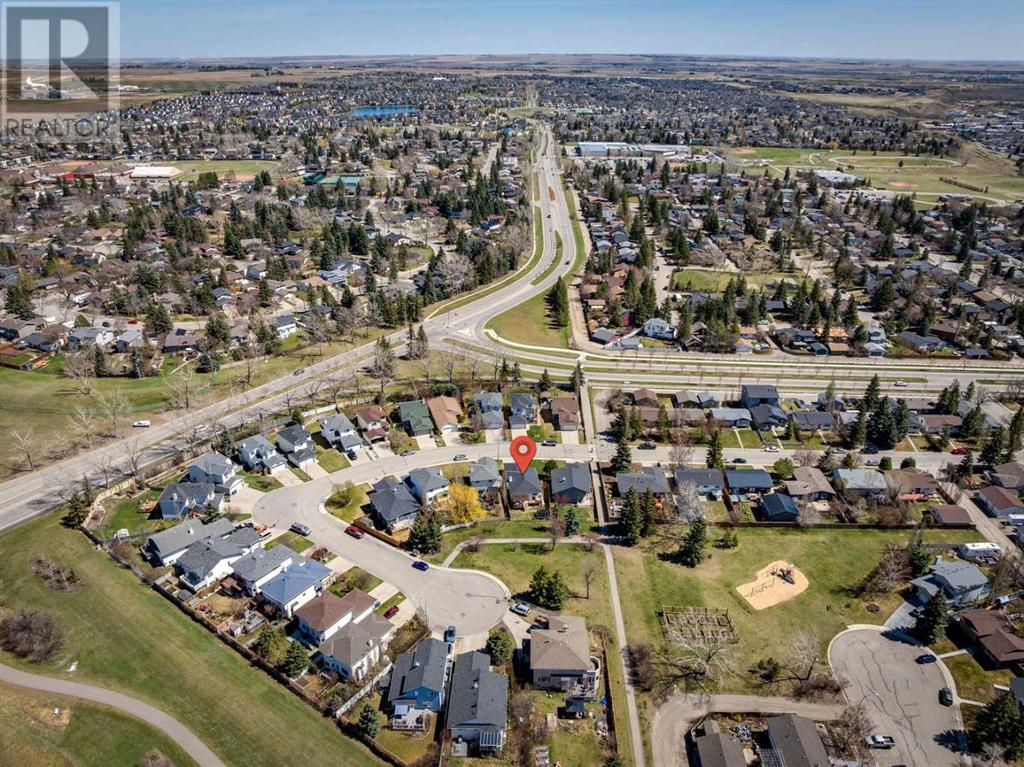 Single Family House Bi-level for Sale in  Alcock Close Rosemont Okotoks 