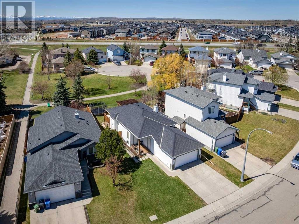 Single Family House Bi-level for Sale in  Alcock Close Rosemont Okotoks 