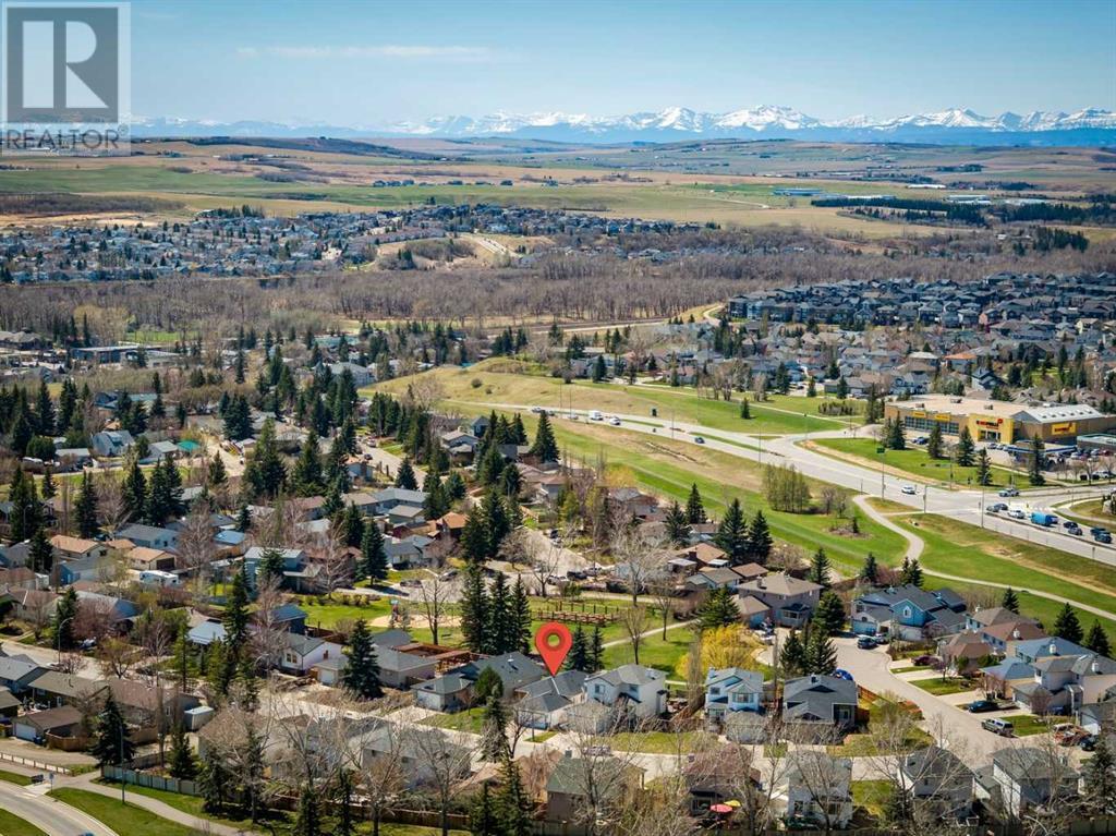 Single Family House Bi-level for Sale in  Alcock Close Rosemont Okotoks 
