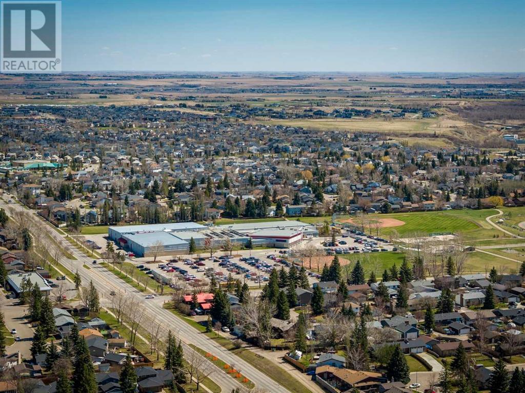 Single Family House Bi-level for Sale in  Alcock Close Rosemont Okotoks 