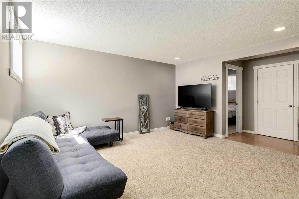 Single Family House Bi-level for Sale in  Alcock Close Rosemont Okotoks 