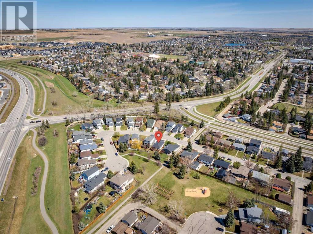 Single Family House Bi-level for Sale in  Alcock Close Rosemont Okotoks 