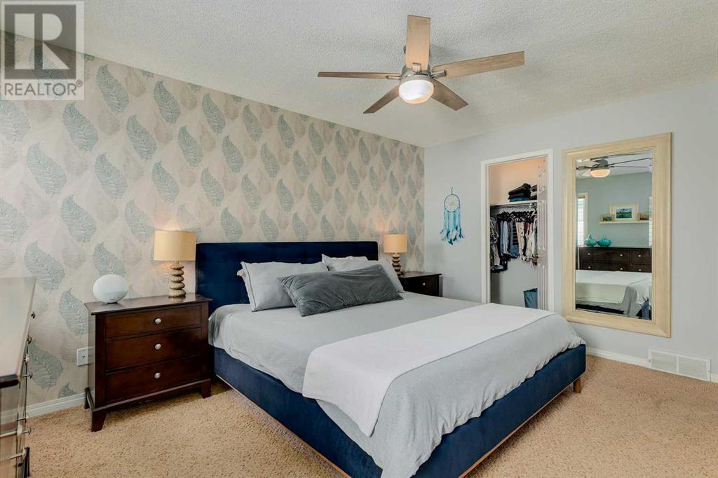 Single Family House Bi-level for Sale in  Alcock Close Rosemont Okotoks 