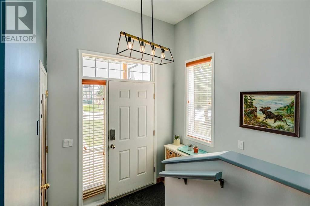 Single Family House Bi-level for Sale in  Alcock Close Rosemont Okotoks 
