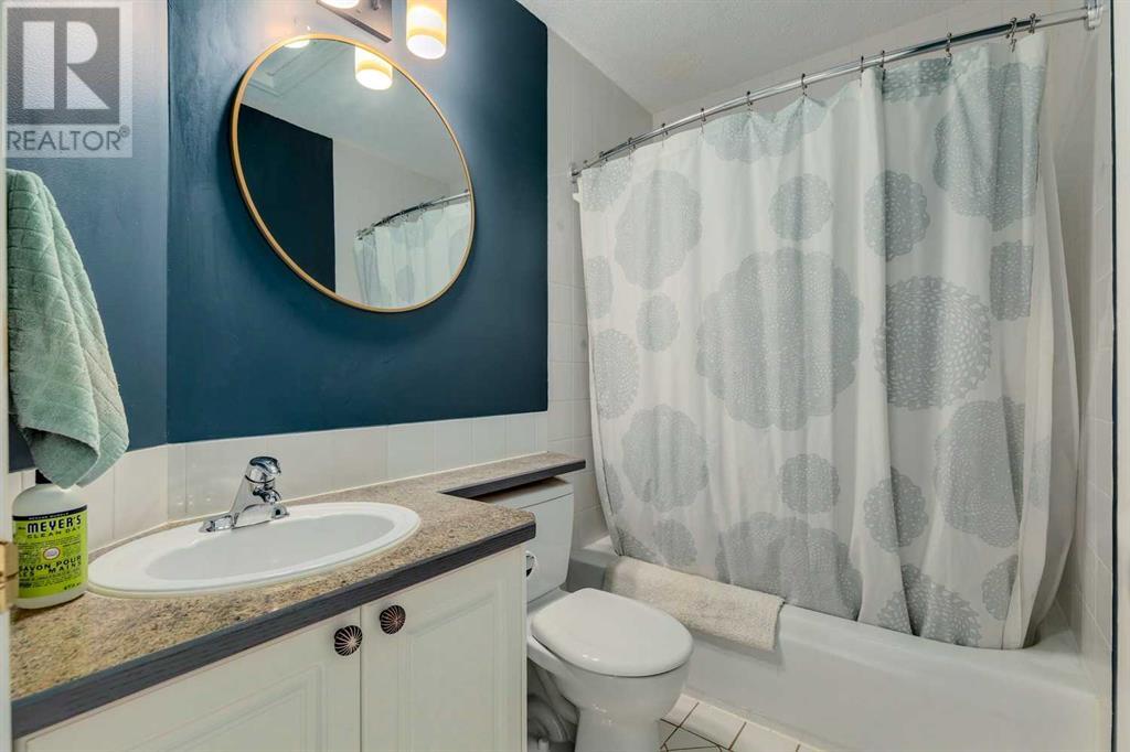 Single Family House Bi-level for Sale in  Alcock Close Rosemont Okotoks 