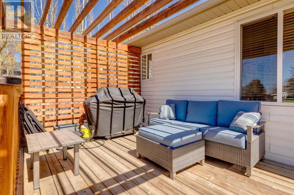 Single Family House Bi-level for Sale in  Alcock Close Rosemont Okotoks 