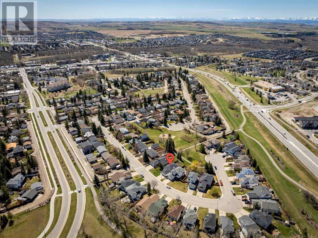 Single Family House Bi-level for Sale in  Alcock Close Rosemont Okotoks 