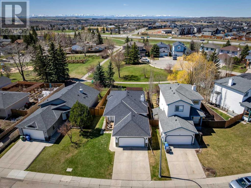 Single Family House Bi-level for Sale in  Alcock Close Rosemont Okotoks 