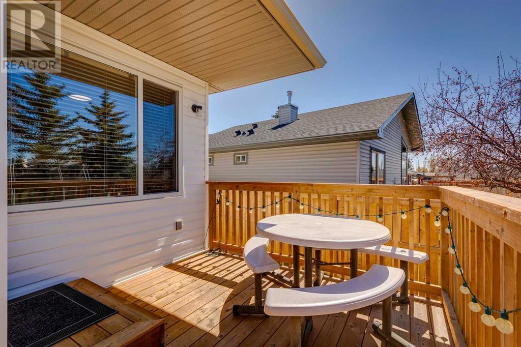 Single Family House Bi-level for Sale in  Alcock Close Rosemont Okotoks 