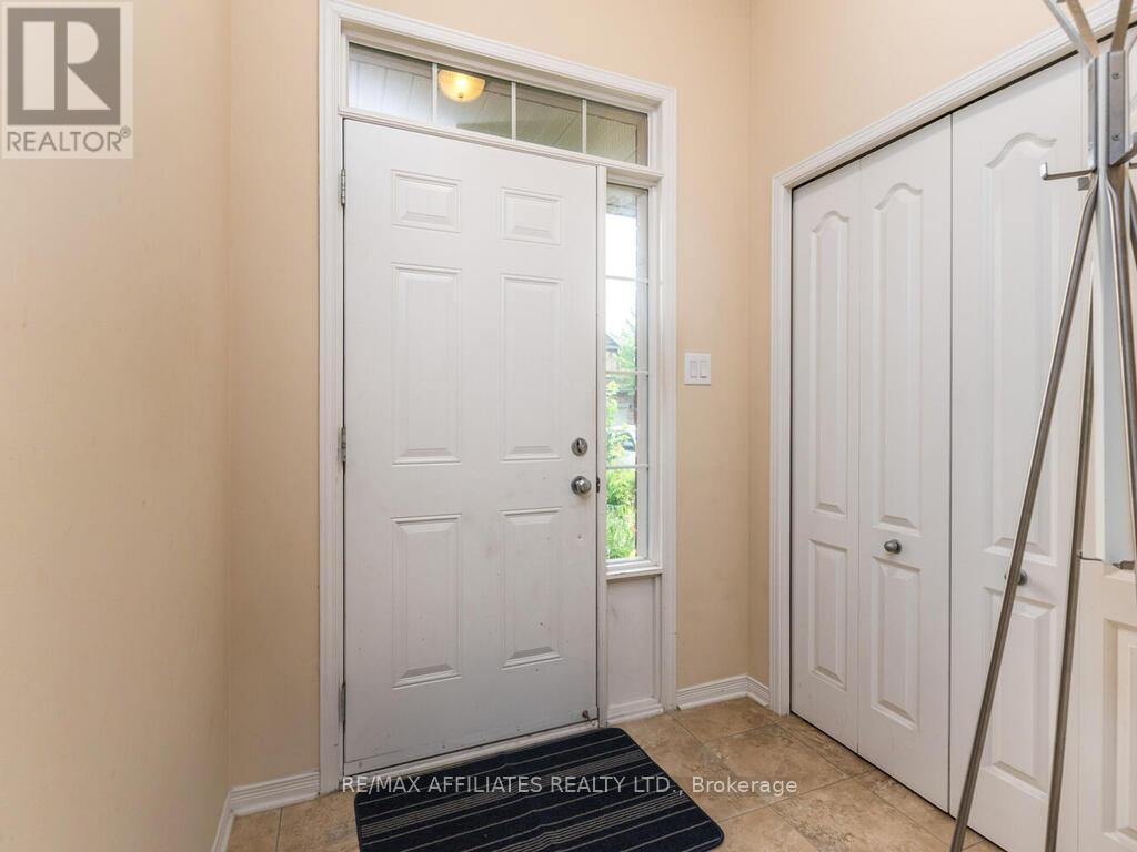 Step inside, large coat closet, tile flooring!