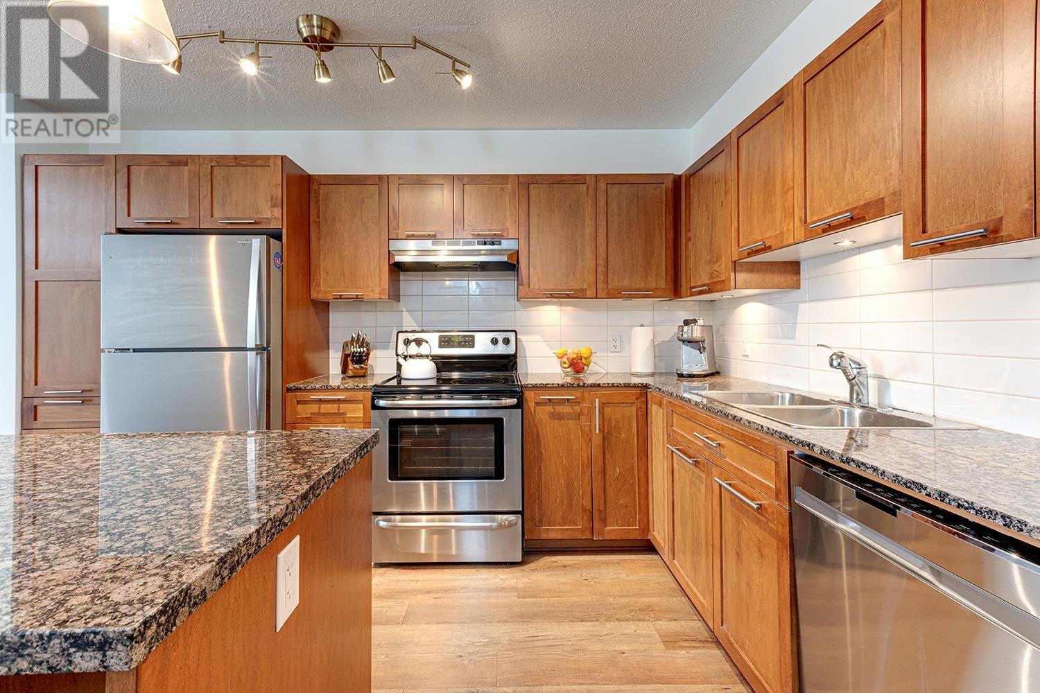 405 19673 MEADOW GARDENS WAY, Pitt Meadows real estate listing R3012556