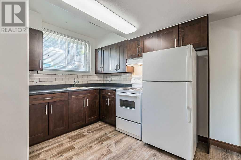 Single Family House Bi-level for Sale in   Street NW Rosemont Calgary 
