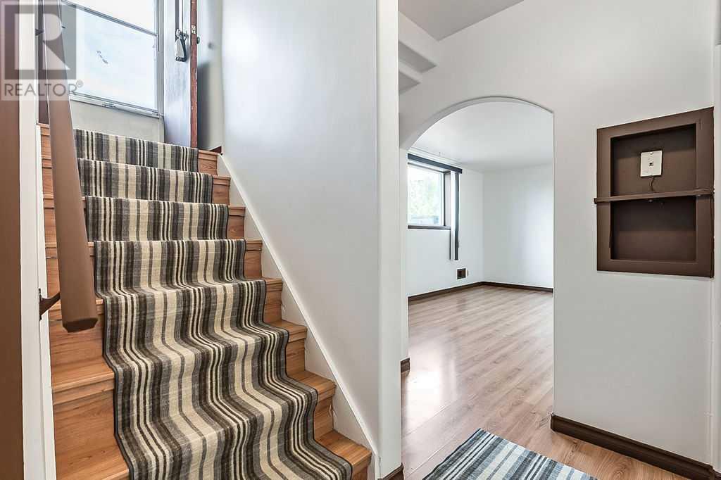 Single Family House Bi-level for Sale in   Street NW Rosemont Calgary 