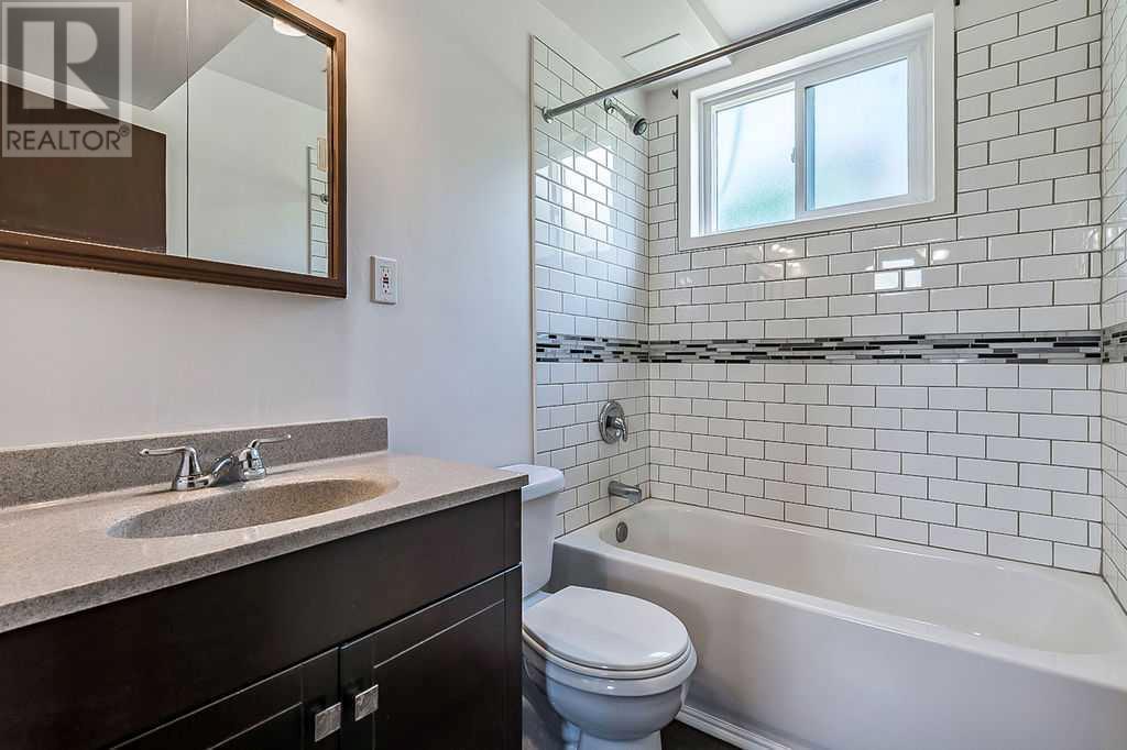 Single Family House Bi-level for Sale in   Street NW Rosemont Calgary 