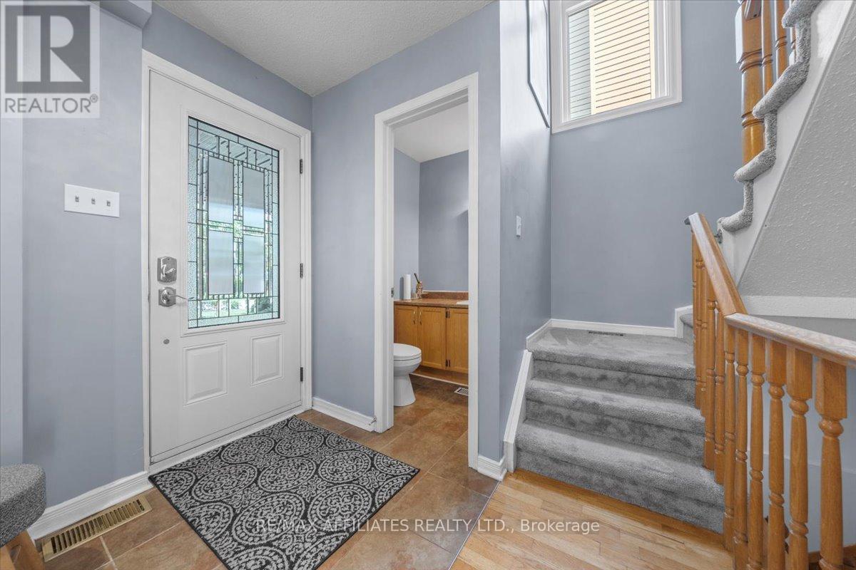 Open concept foyer opens to living and dining area