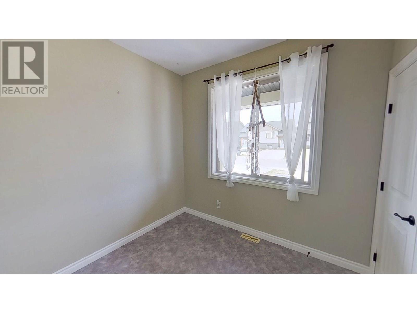 Photo 11 of 8311 87 Avenue, Fort St John BC