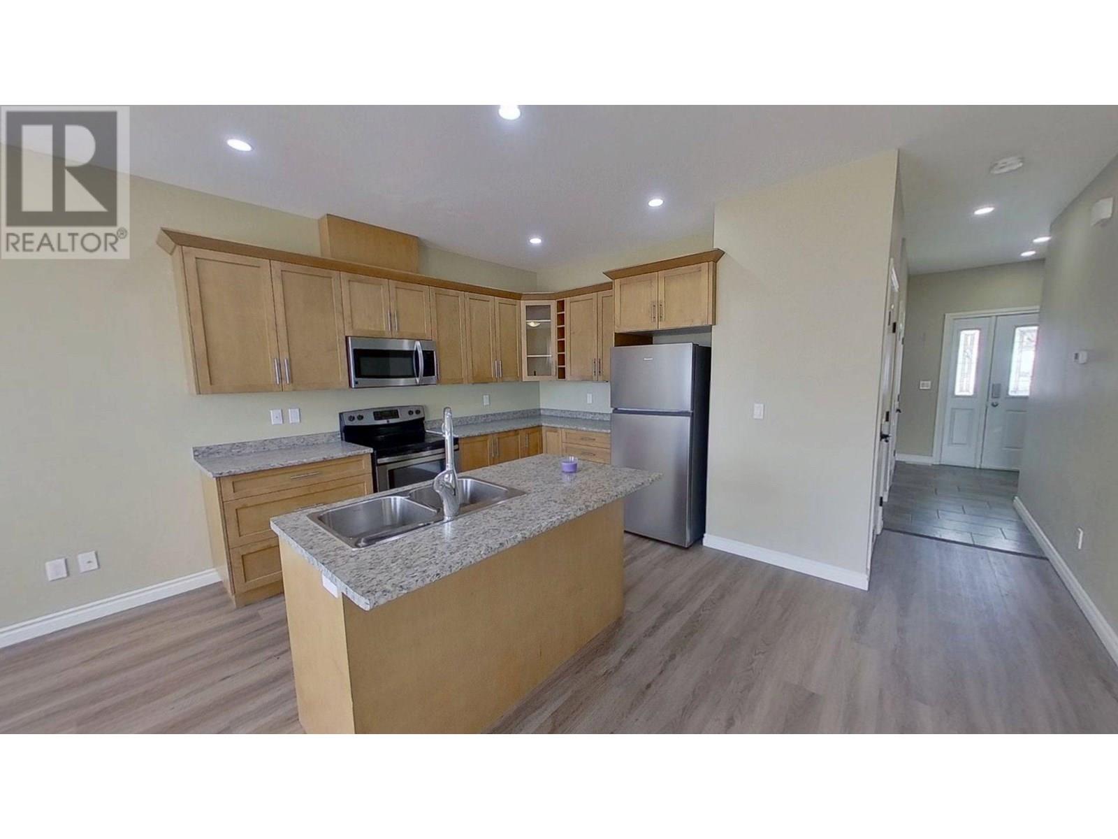 Photo 7 of 8311 87 Avenue, Fort St John BC