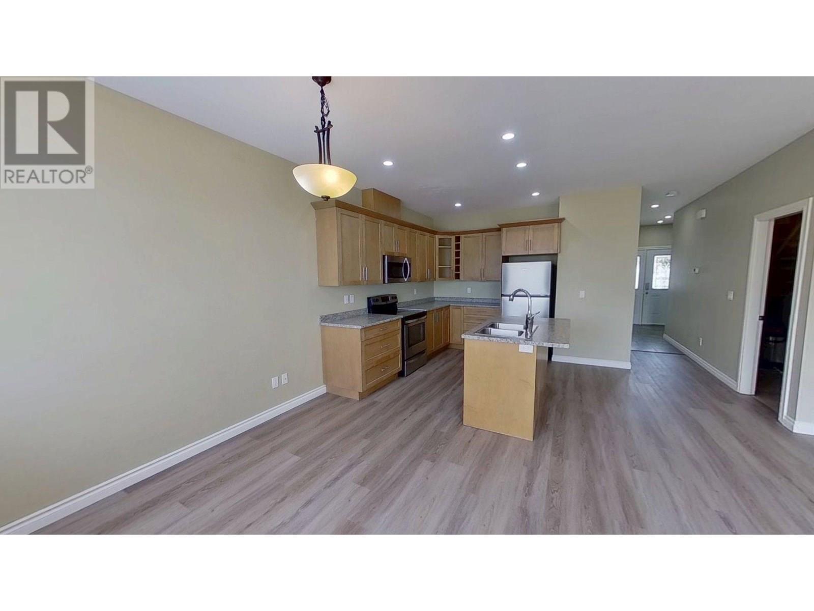 Photo 6 of 8311 87 Avenue, Fort St John BC