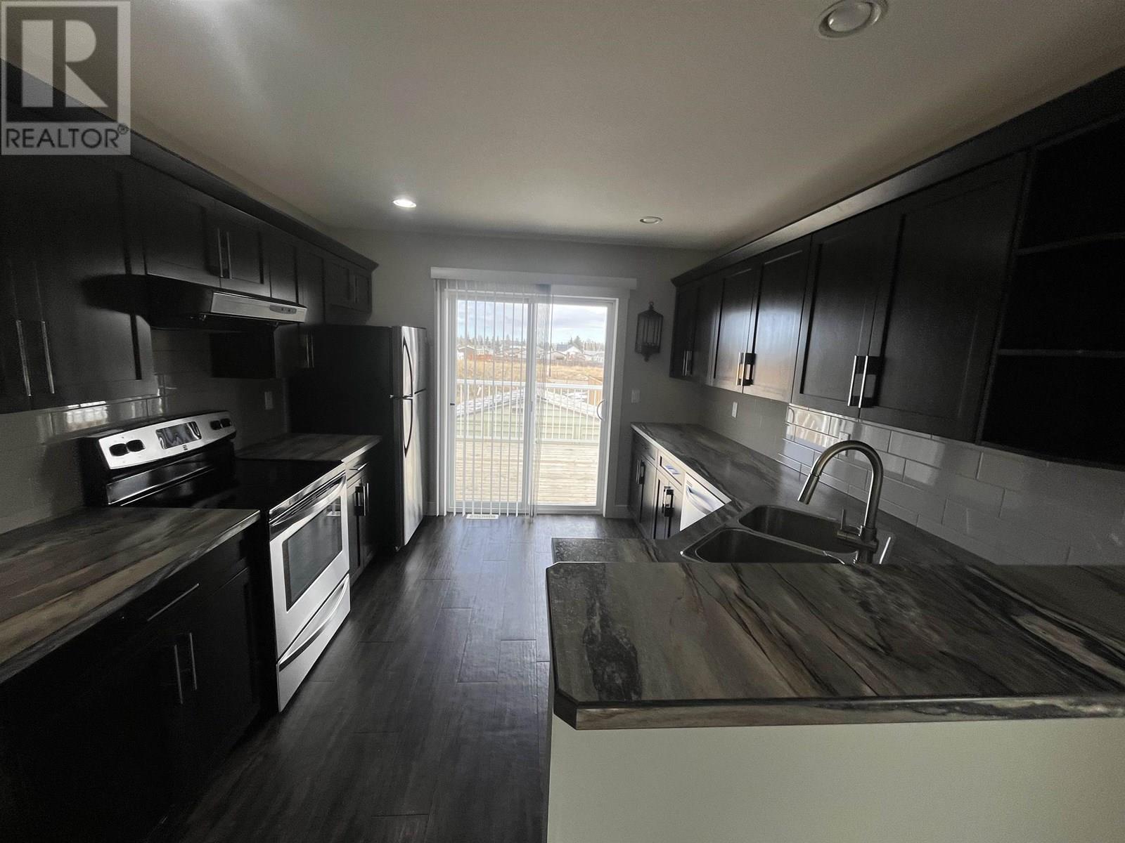 Photo 5 of 8615 81 A Street, Fort St John BC