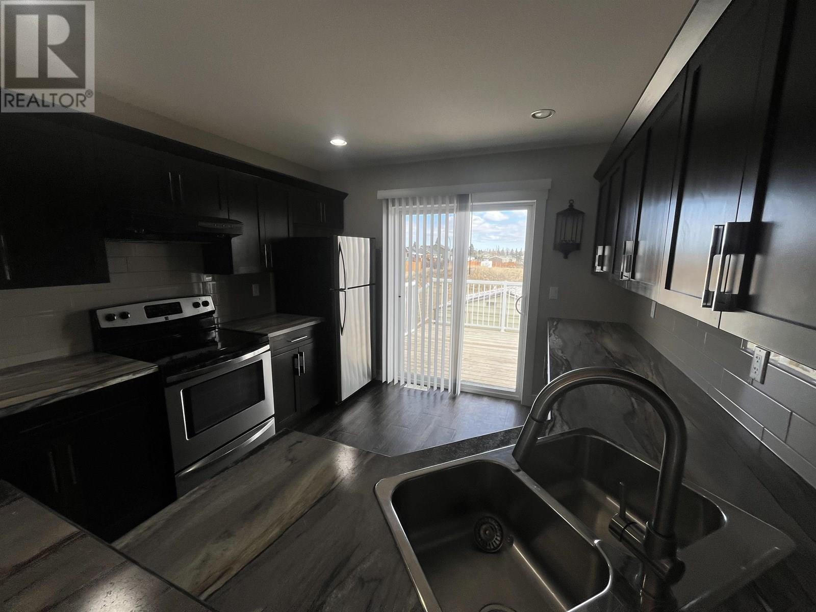 Photo 3 of 8615 81 A Street, Fort St John BC
