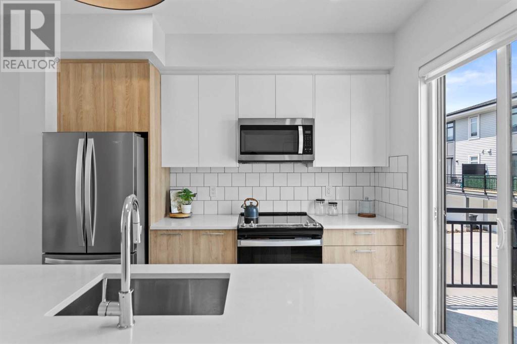 Single Family House for Sale in   Belmont Drive SW Belmont Calgary 