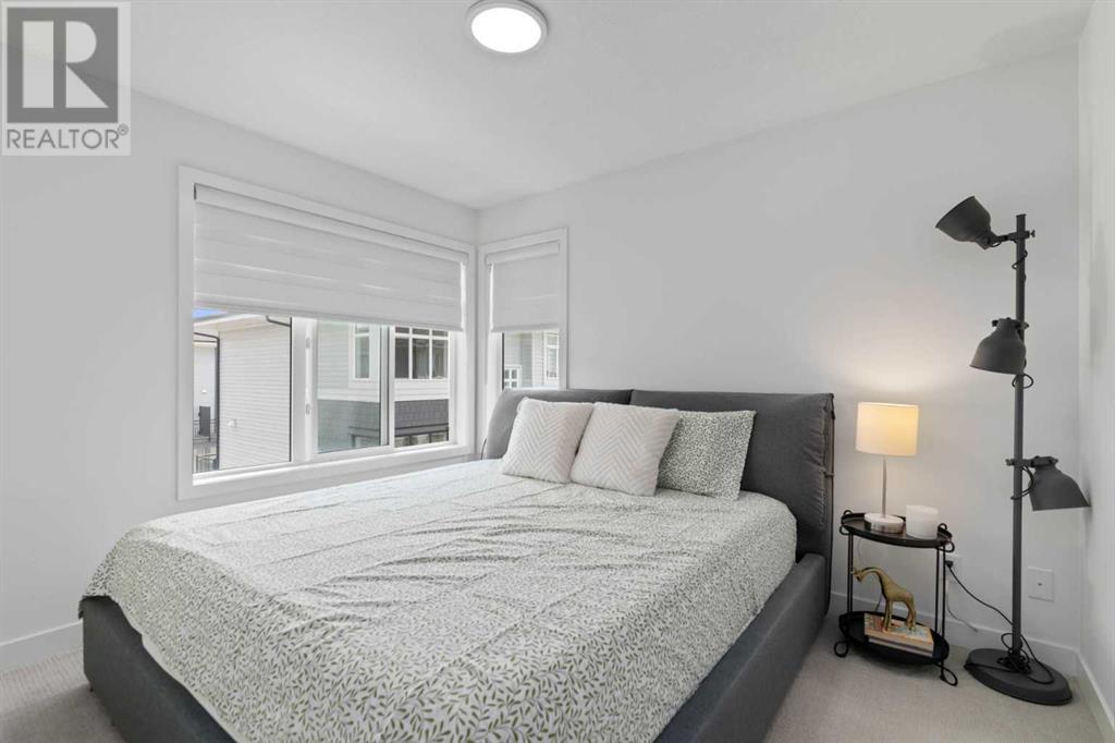 Single Family House for Sale in   Belmont Drive SW Belmont Calgary 
