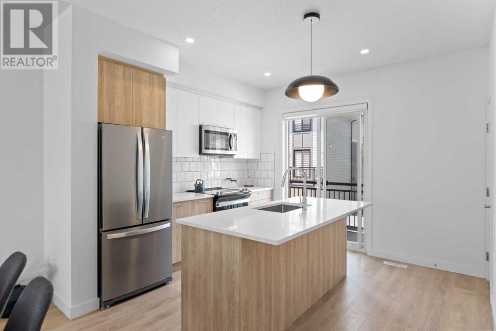 Single Family House for Sale in   Belmont Drive SW Belmont Calgary 