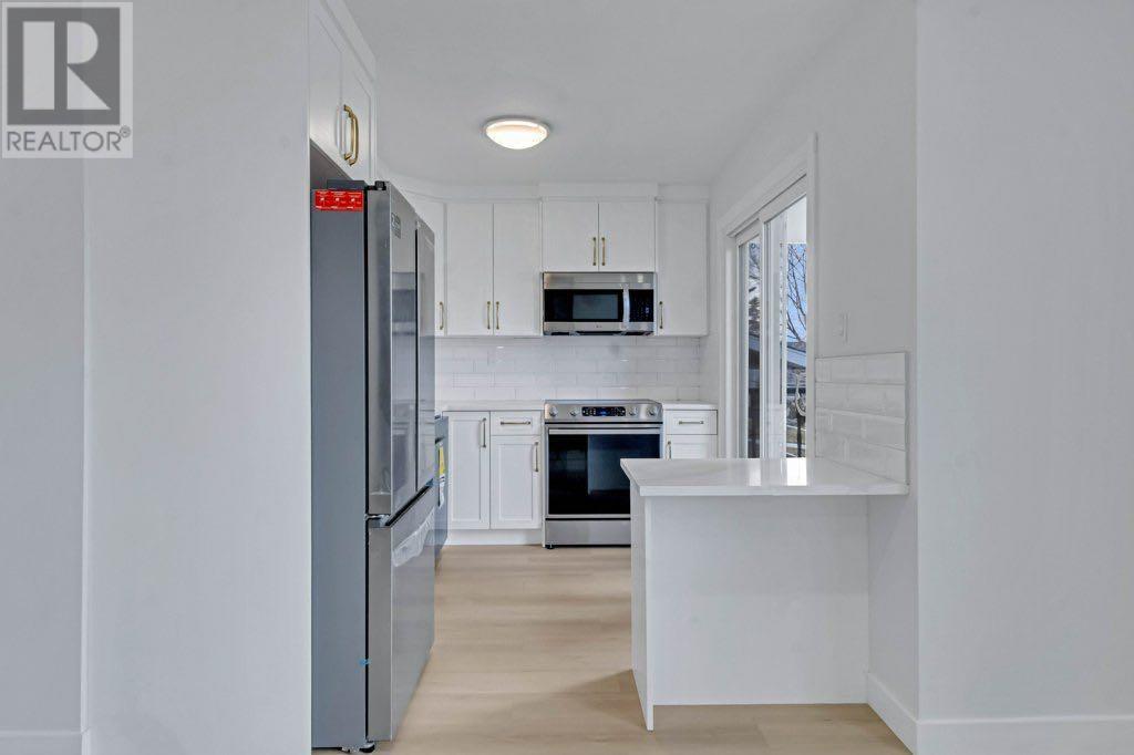 Single Family House Bi-level for Sale in  Penmeadows Close SE Penbrooke Meadows Calgary 