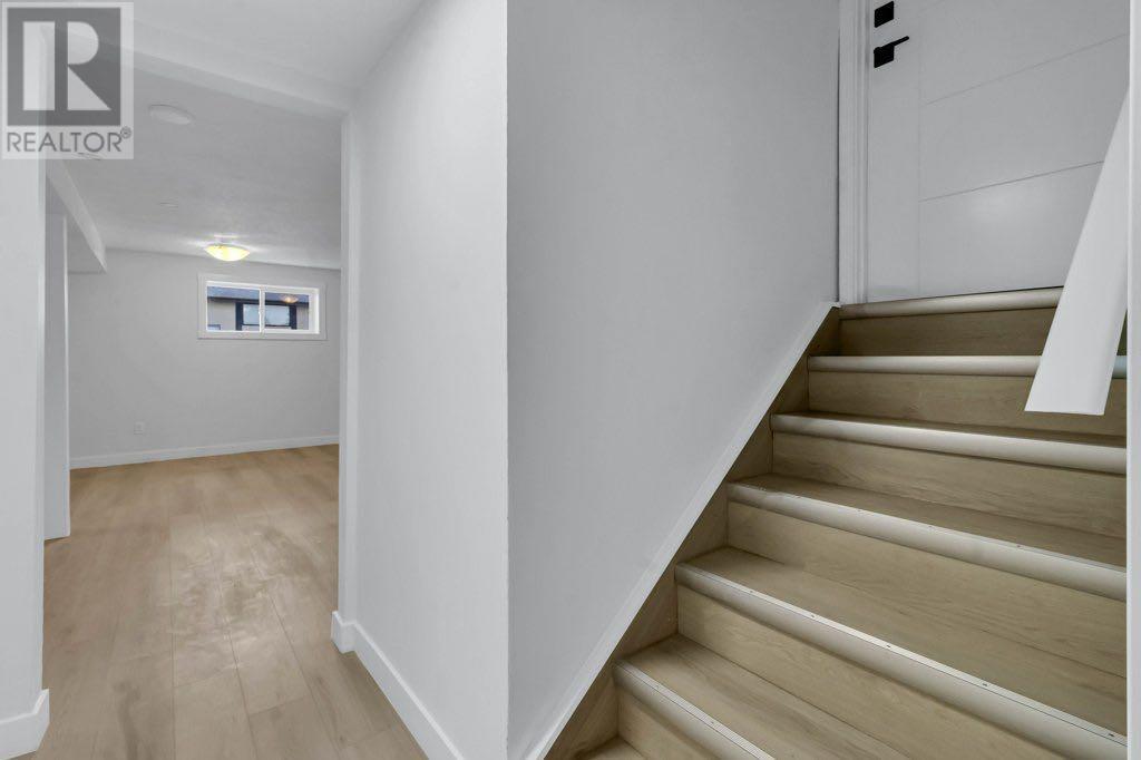 Single Family House Bi-level for Sale in  Penmeadows Close SE Penbrooke Meadows Calgary 