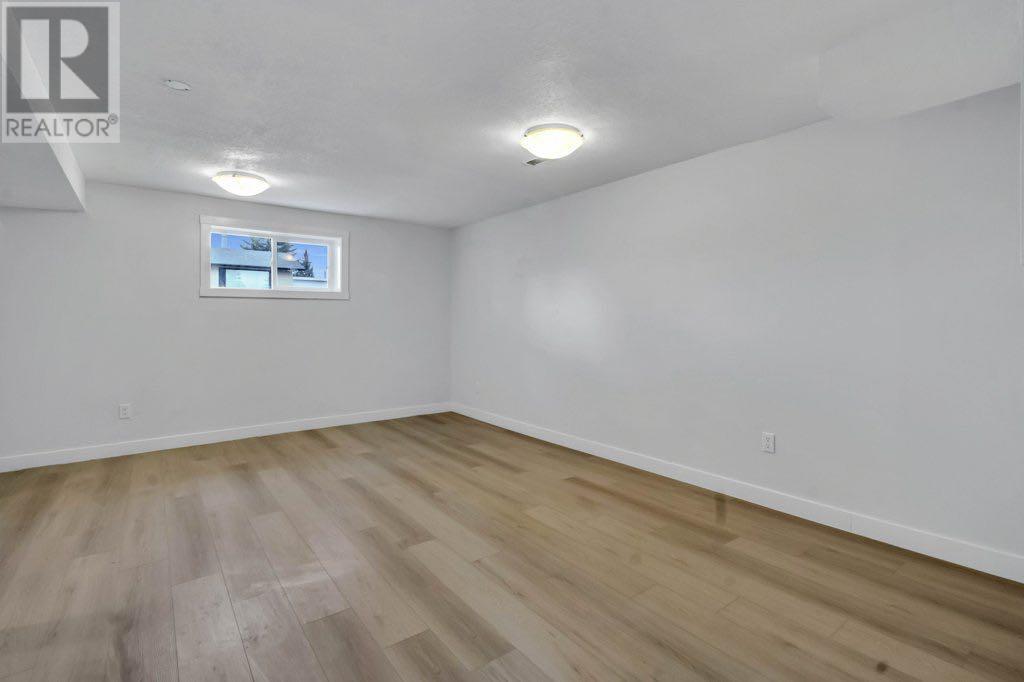 Single Family House Bi-level for Sale in  Penmeadows Close SE Penbrooke Meadows Calgary 