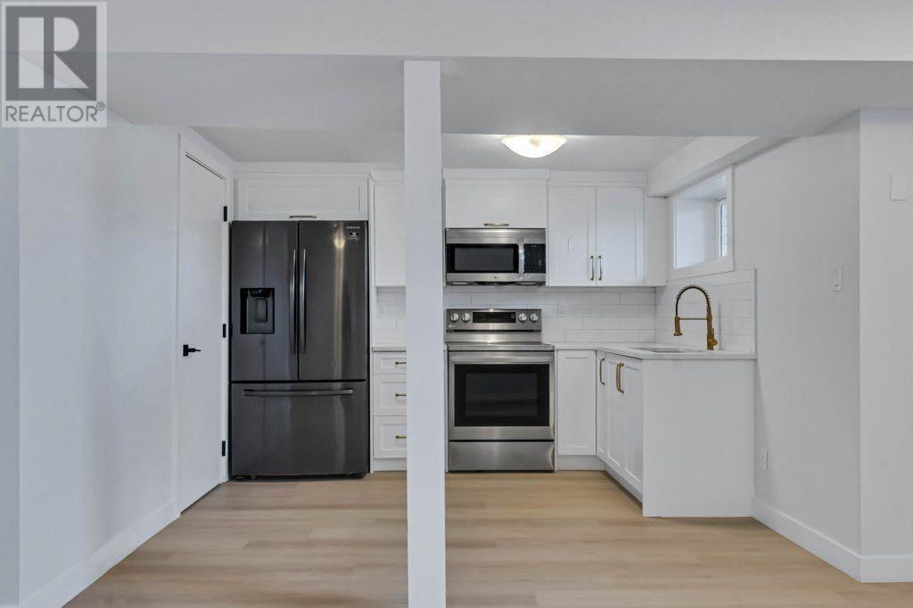 Single Family House Bi-level for Sale in  Penmeadows Close SE Penbrooke Meadows Calgary 