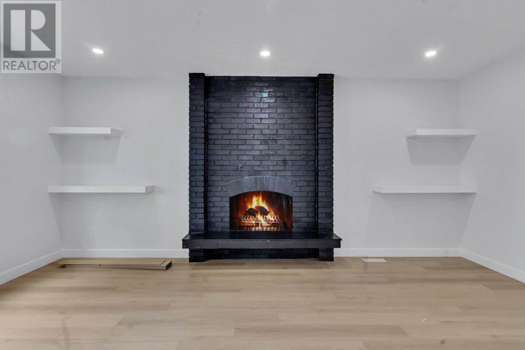 Single Family House Bi-level for Sale in  Penmeadows Close SE Penbrooke Meadows Calgary 