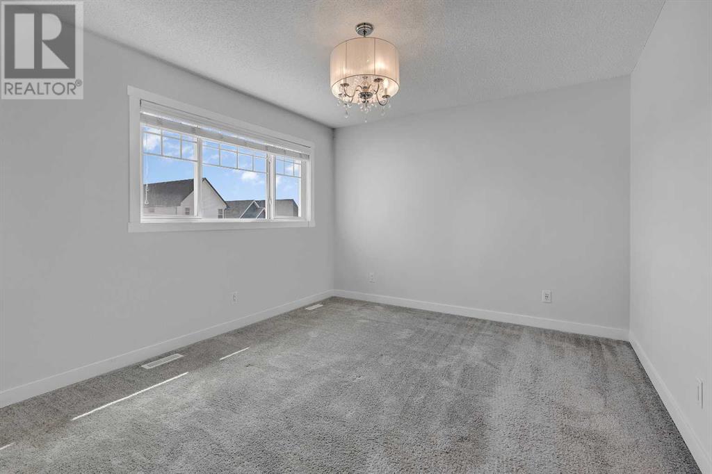 Single Family House for Sale in  Lucas Manor NW Livingston Calgary 