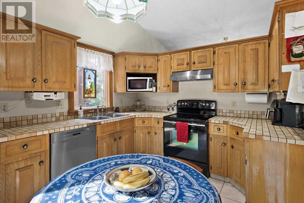 Single Family House 5 Level for Sale in  Ranchridge Way NW Ranchlands Calgary 