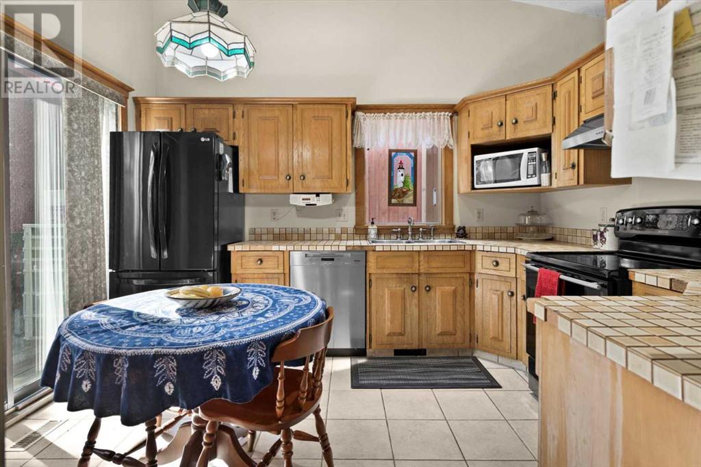 Single Family House 5 Level for Sale in  Ranchridge Way NW Ranchlands Calgary 